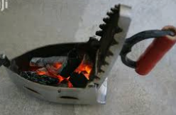charcoal iron, history of ironing