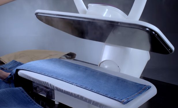 ironing with steam press