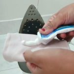 cleaning iron plate with toothpaste
